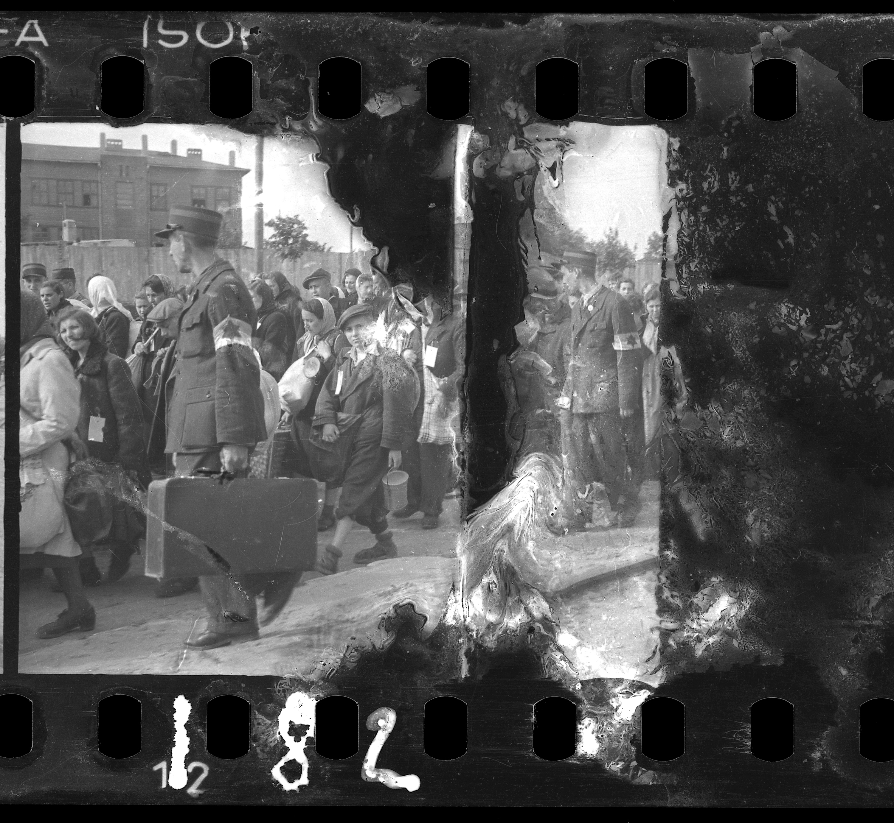 Ghetto police escorting residents for deportation. Henryk Ross (Polish, 1910–1991). Ghetto police escorting residents for deportation. Henryk Ross (Polish, 1910–1991).